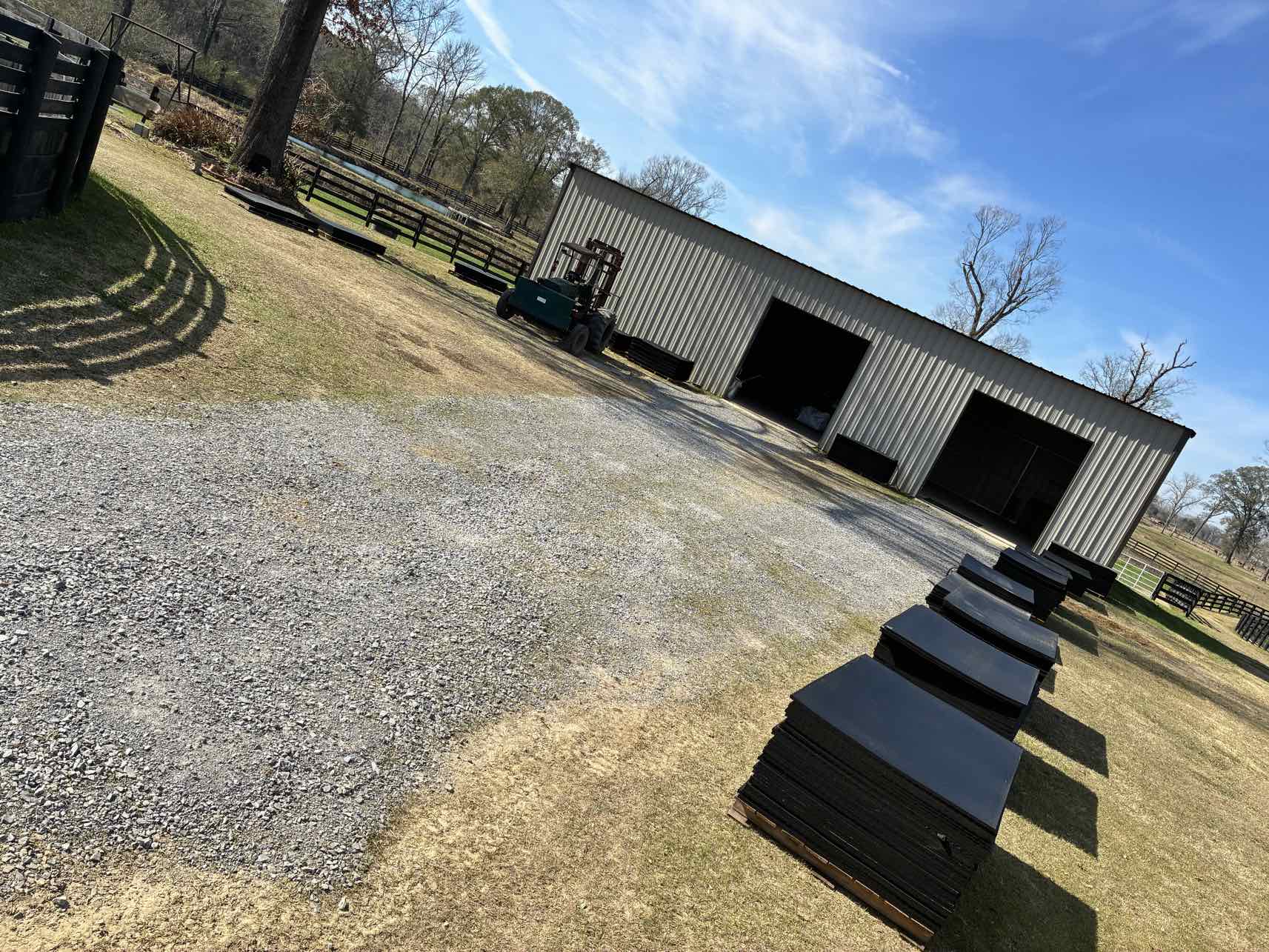 Our Texas facility with pallets of rubber mats